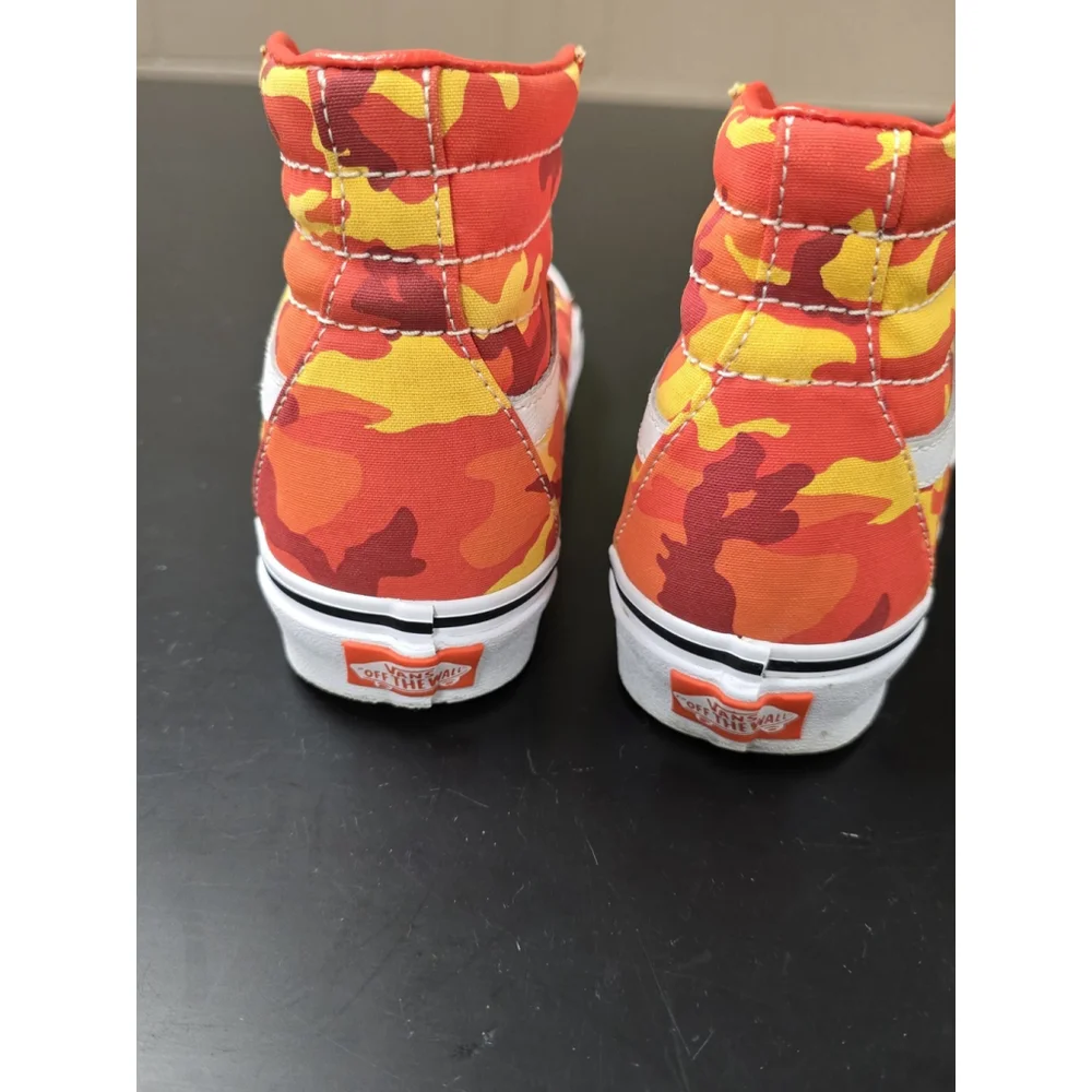 Vans Sk8-Hi high-top sneakers in an orange and yellow camouflage